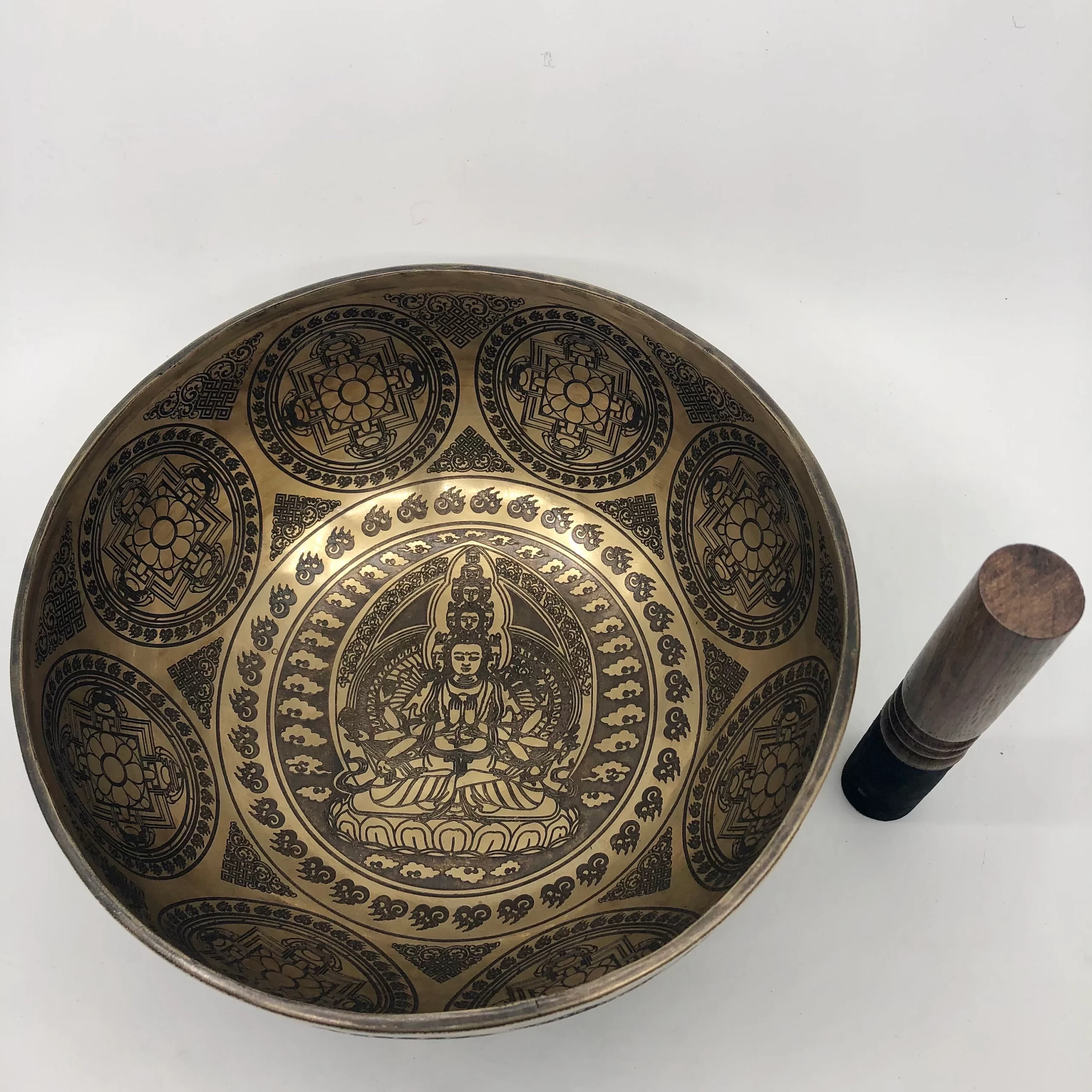 Diameter: 23 cm Weight: 1.3 kg [excluding cushion and a mallet] The package will include a Singing bowl, Cushion and a mallet Made in Nepal Handmade, Hand carved